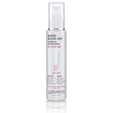 A clear Giovanni Cosmetics RAPID BLOW-DRY SHIELD AND STYLE SPRAY bottle with pink and black text stands on a white background—ideal for all hair types, offering frizz control and heat protection during blow-drying.