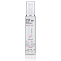 A clear Giovanni Cosmetics RAPID BLOW-DRY SHIELD AND STYLE SPRAY bottle with pink and black text stands on a white background—ideal for all hair types, offering frizz control and heat protection during blow-drying.