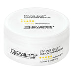 A white container of Giovanni Cosmetics STYLING GLUE™ CUSTOM HAIR MODELER, 2 oz (57 g), featuring black text and yellow dots on the lid and side. This salon-quality, color-safe styling glue provides a strong hold while caring for your hair.