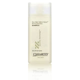 Giovanni Cosmetics TEA TREE TRIPLE TREAT™ INVIGORATING SHAMPOO (TRAVEL SIZE) is a 2 fl oz clear bottle with a white cap, designed for all hair types and formulated to boost scalp circulation with Eco Chic Technology.