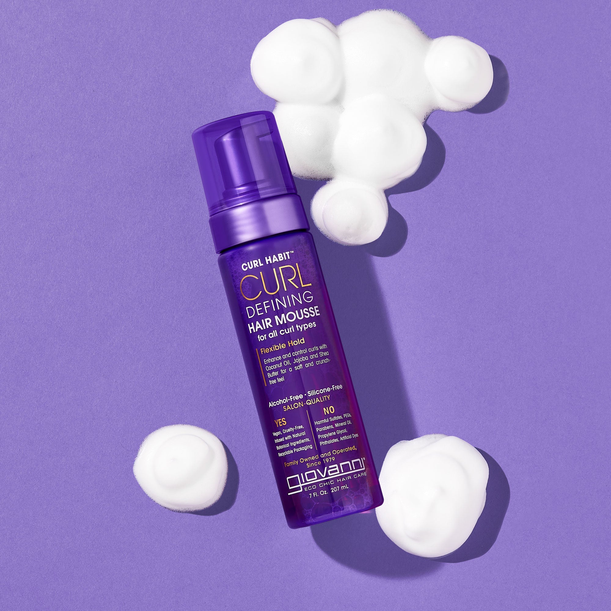Giovanni Curl Defining Hair Mousse on a purple background