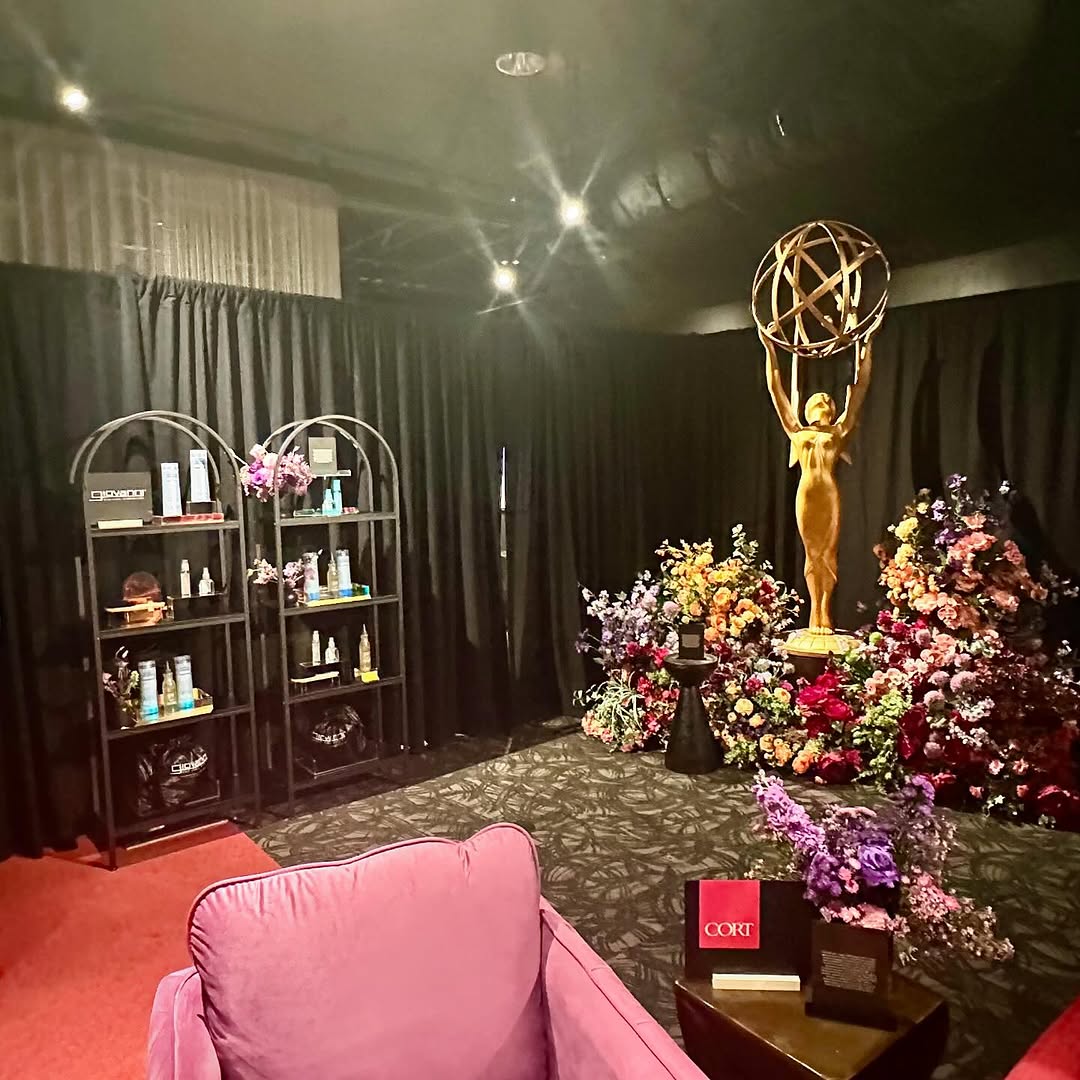 The Emmy statue with Giovanni products