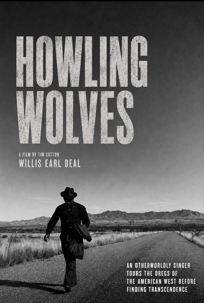 Movie poster for 'Howling Wolves' featuring a black-and-white western landscape with a man walking down a road