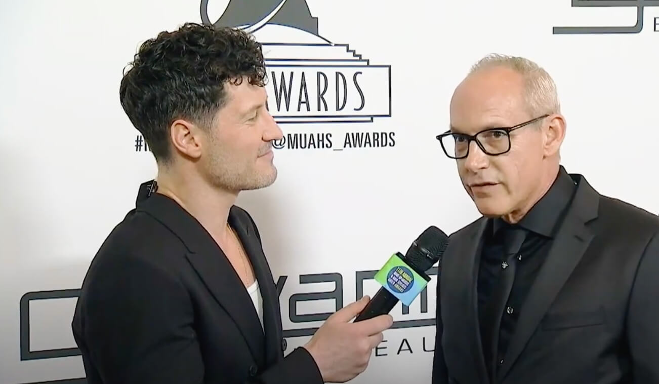 Giovanni Guidotti being interviewed on the red carpet at the MUAHS Awards