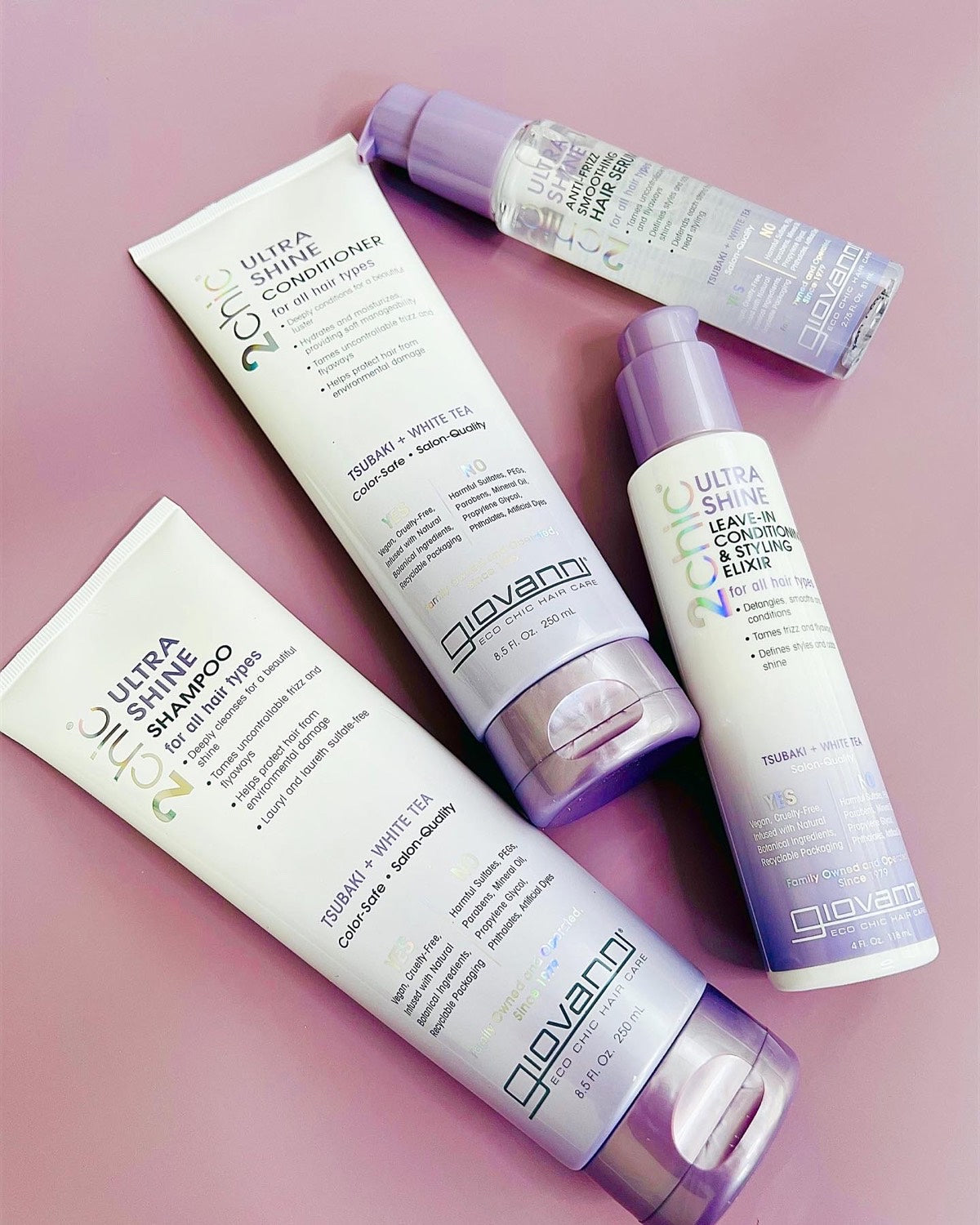 The Giovanni Cosmetics 2chic® ULTRA-SHINE CONDITIONER, available in 2 sizes, features chic white and lavender packaging with green accents—perfect for any natural hair care routine.