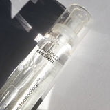 A clear bottle labeled L.A. HOLD™ HAIR SPRITZ by Giovanni Cosmetics sits on a white surface in sunlight, ideal for anyone seeking salon-quality, color-safe hair spray.