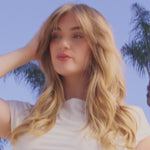 Video of blonde model showing results of Rapid Blow Dry & Hair Texturizing Spray use. 