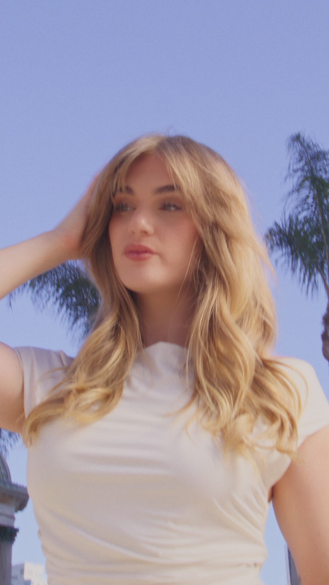 Video of blonde model showing results of Rapid Blow Dry & Hair Texturizing Spray use. 