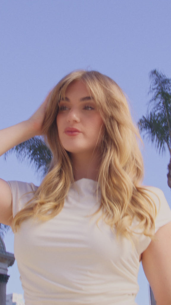 Video of blonde model showing results of Rapid Blow Dry & Hair Texturizing Spray use. 