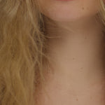 Video of blonde with frizzy hair using Smooth As Silk Shampoo & Conditioner showing before and after results. 