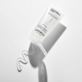 A clear squeeze tube of Giovanni Cosmetics STRAIGHT FAST™ Straightening Elixir lies on a white surface, cap open, with a wavy line of clear gel emerging from the nozzle.